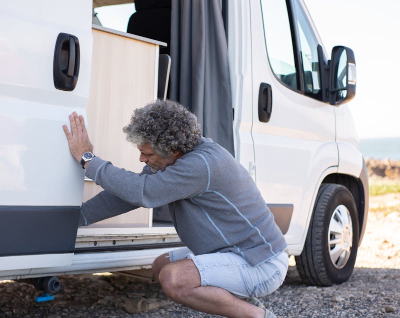a man building a motorhome